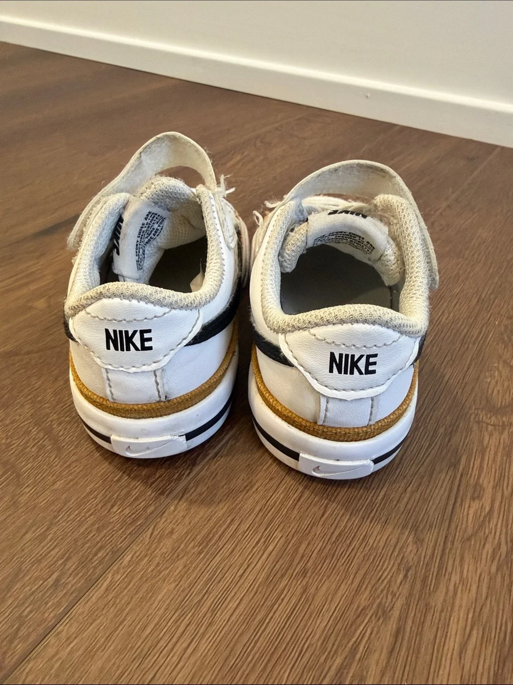 Nike Kids White and Tan Low-Top Sneakers with Black Swoosh